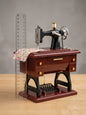 Vintage sewing machine music box with miniature floral fabric