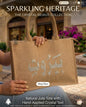 Sparkling Heritage collection natural jute tote bag embellished with silver crystal Beirut Arabic calligraphy.