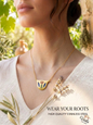 Woman wearing the Wear Your Roots gold-plated Lebanese heritage tile necklace