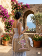 Woman holding a hand-painted jute tote bag in front of a historic Lebanese stone arch with bougainvillea